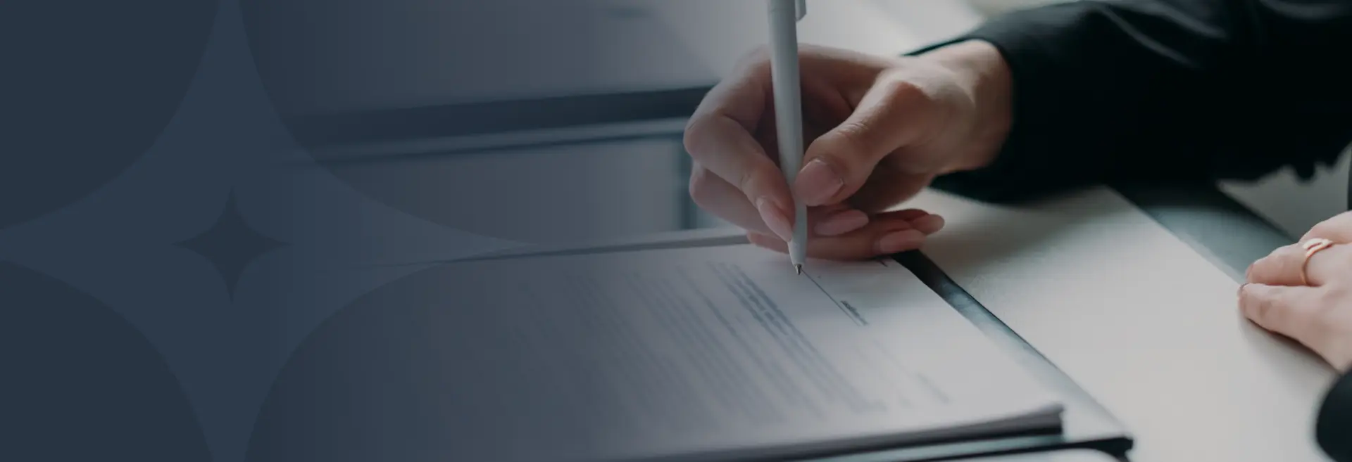 Background image of a chrome faucet with reflections